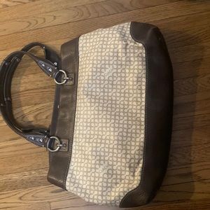 It’s a coach purse and cute